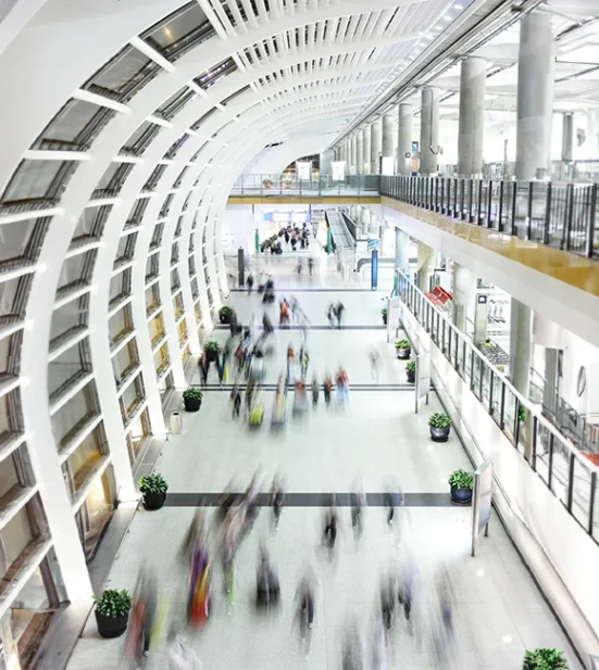 contact a group of people in an airport building